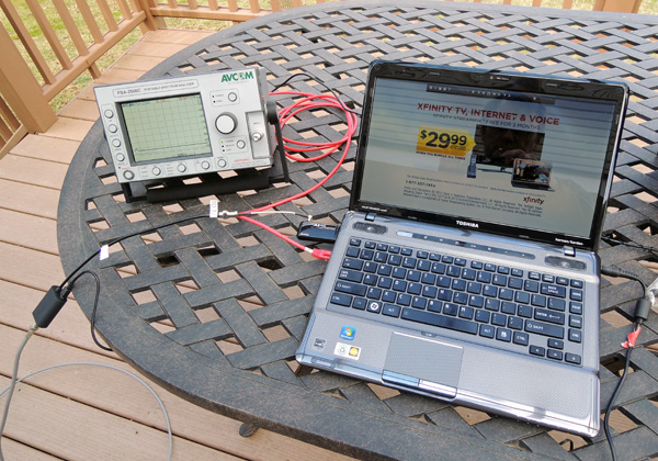 Here's my test rig, with an AVCOM spectrum analyzer and Hauppauge Aero-M connected to my Toshiba latop for reception and measurements.