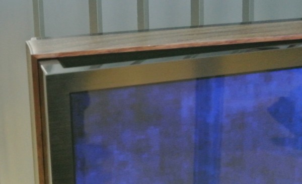 Samsung's bendable TV with the corner pushed out into the screen's curved configuration. (Photo: Ken Werner)