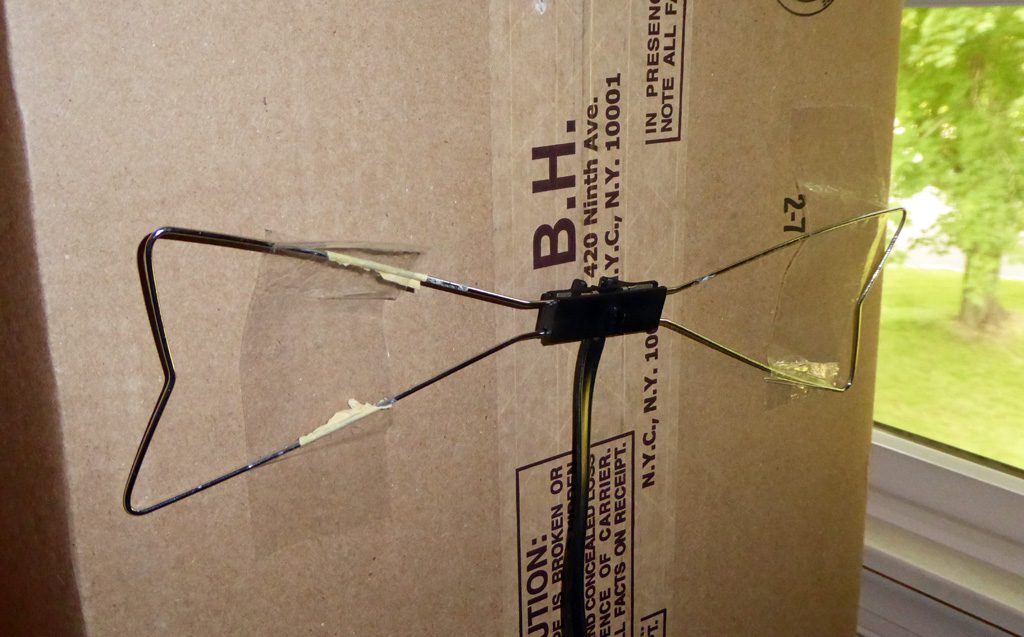 My well-traveled, well-worn Radio Shack bow tie antenna, under test.