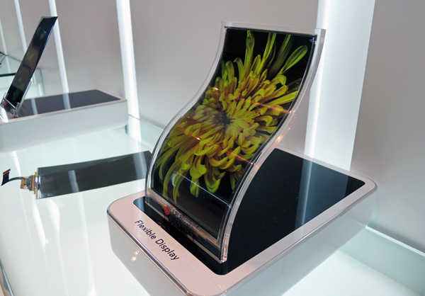 You can now buy the concave-surface LG G-Flex smartphone. But I don't think you'll see any of these in the near future...
