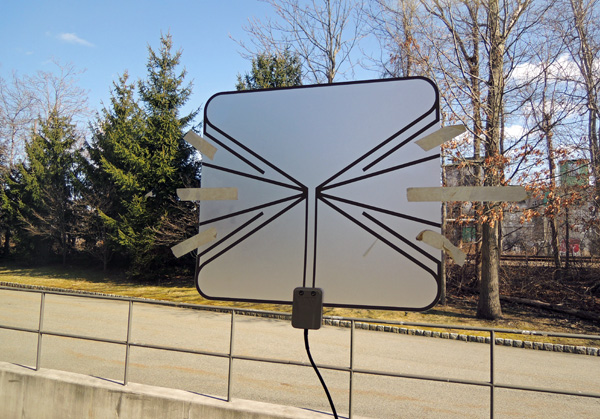 It's a little bit easier to attach Winegard's FlatWave with masking tape...